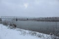 Winter landscape. River lake without ice swamp plants neg. winter entertainment. Plants in the snow