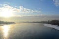 Winter landscape with river on sunset. Russian landscape