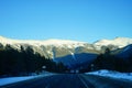 Road under snow mountain Royalty Free Stock Photo