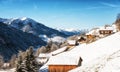 Winter landscape with ski lodge in austrian alps Vorarlberg area Royalty Free Stock Photo