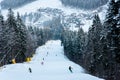 Winter landscape ski slope of resort Bukovel with skiers