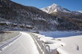 Winter landscape with ski tracks in the sunshine, italian Alps Royalty Free Stock Photo