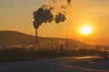 Winter landscape smoke from the chimneys TPP frosty misty morning