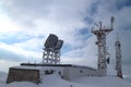 Winter landscape in the snow-capped mountain: scientific meteorological station