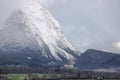 Winter landscape with snow covered Grimming mountain and Trautenfels Castle in the district of Liezen in Styria, Austria Royalty Free Stock Photo