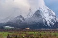 Winter landscape with snow covered Grimming mountain and Trautenfels Castle in Ennstal, Steiermark, Austria Royalty Free Stock Photo
