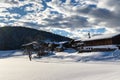 Winter landscape with a snow-covered house in the ski area, reit im winkl