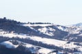 Winter landscape with snow and fog in the Tosco Emiliano Apennines, Bologna, Italy