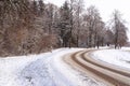 Winter landscape and snowy, icy forest road Royalty Free Stock Photo