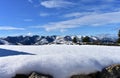 Winter landscape with snowy mountains and field with stone wall covered with snow. Piornedo village, Ancares, Galicia, Spain. Royalty Free Stock Photo