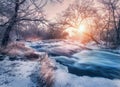 Winter landscape with snowy trees, ice, beautiful frozen river Royalty Free Stock Photo
