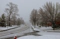 Winter landscape street of a small town snow covered pavement Canada USA