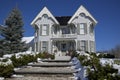 Winter landscape of Victorian style house with deep snow in winter Royalty Free Stock Photo