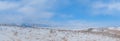 Winter landscape. View of the mountains and frozen Lake Baikal from the Ogoy island. Siberia, Russia Royalty Free Stock Photo