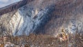 Winter landscape - view of the temple of the Greek-Catholic Church on the background of the rock in valley Prut River the Carpathi Royalty Free Stock Photo