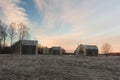 Winter landscape with wooden houses. Beautiful day in Russian countryside Royalty Free Stock Photo