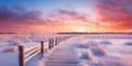 Winter landscape with wooden path at sunset. Winter nature background