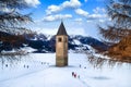 Reschensee Resia lake, on the border between the South Tyrol Royalty Free Stock Photo