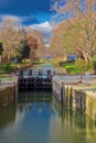 A lock gate on the Canal de la Robine, a tributary of the Canal du Midi, near Narbonne, France Royalty Free Stock Photo