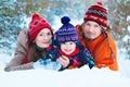 Winter Lifestyle Concept - Happy Family Having Fun in Park