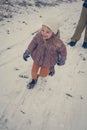 Winter magic. Little girl at snow.