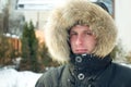 Winter - man in warm jacket with furry hood