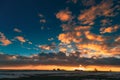 Winter Meadow Field At Evening Sunset. Natural Bright Dramatic Sky Colours Above Countryside Snowy Landscape Royalty Free Stock Photo