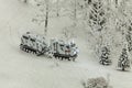 Military camouflaged caterpillar off-road vehicle