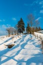 Winter morning mountain rural snow covered path Royalty Free Stock Photo