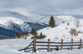 Winter morning scenery picturesque mountain rural snow covered path and footprint on hill top Ukraine, Carpathian Mountains, Royalty Free Stock Photo