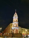 Duma Tower on Nevsky Prospekt in St. Petersburg, decorated with lights and garlands for Christmas and New Year