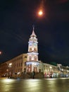 Duma Tower on Nevsky Prospekt in St. Petersburg, decorated with lights and garlands for Christmas and New Year