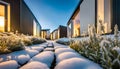 Winter morning street with hi-tech style houses, the ground is covered with snow and frost, peaceful morning Royalty Free Stock Photo