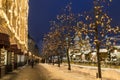 Winter Moscow, people walk on red square in the evening near the Main Department store and fair Royalty Free Stock Photo