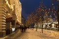 Winter Moscow, people walk on red square in the evening near the Main Department store and fair Royalty Free Stock Photo