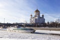 Winter Moscow. View of the Cathedral of Christ the Savior, the frozen river and tourist boat icebreaker type