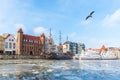 Winter Motlawa river in Gdansk, view on the Mariacka Gate and the ships