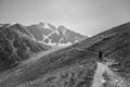 A girl walking along the trail on Mount Cheget