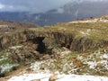 Winter in Mount Lebanon. View of kfardebiane natural bridge with mountains in background  snowy natural  landscape Royalty Free Stock Photo