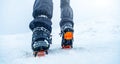 Winter mountain ascending in boot crampons Royalty Free Stock Photo