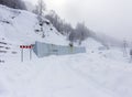 Winter mountain forest, located on the ridge of the tourist route, in the area of a mountain campsite high in the mountains.