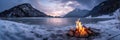 Winter mountain landscape of fire burning on frozen lake