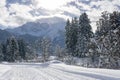 Winter mountain landscape with groomed ski track Royalty Free Stock Photo