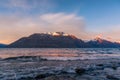 Winter mountain landscape with icy lake and snow-capped mountains Royalty Free Stock Photo