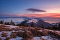 Winter mountain landscape in Mala Fatra at winter from on hill peek Stoh peak at sunrise, Osnica, Slovakia. Royalty Free Stock Photo