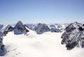 Winter mountain landscape in the Silvretta mountain range in the Swiss Alps with famous Piz Buin mountain peak in the center Royalty Free Stock Photo