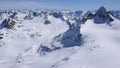 Winter mountain landscape in the Silvretta mountain range in the Swiss Alps with famous Piz Buin mountain peak in the center Royalty Free Stock Photo
