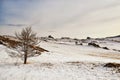 Winter mountain snow valley landscape. Bright high sun above winter snow mountain valley panorama. Siberia landscape Royalty Free Stock Photo