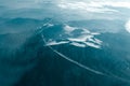 A winter mountain view from plane window