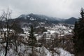 Winter mountain village - Smolyan, Bulgaria. Landscape with snow and little houses, bad winter weather - beautiful nature scenic Royalty Free Stock Photo